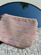 roze toilettas met zeester sleutelhanger