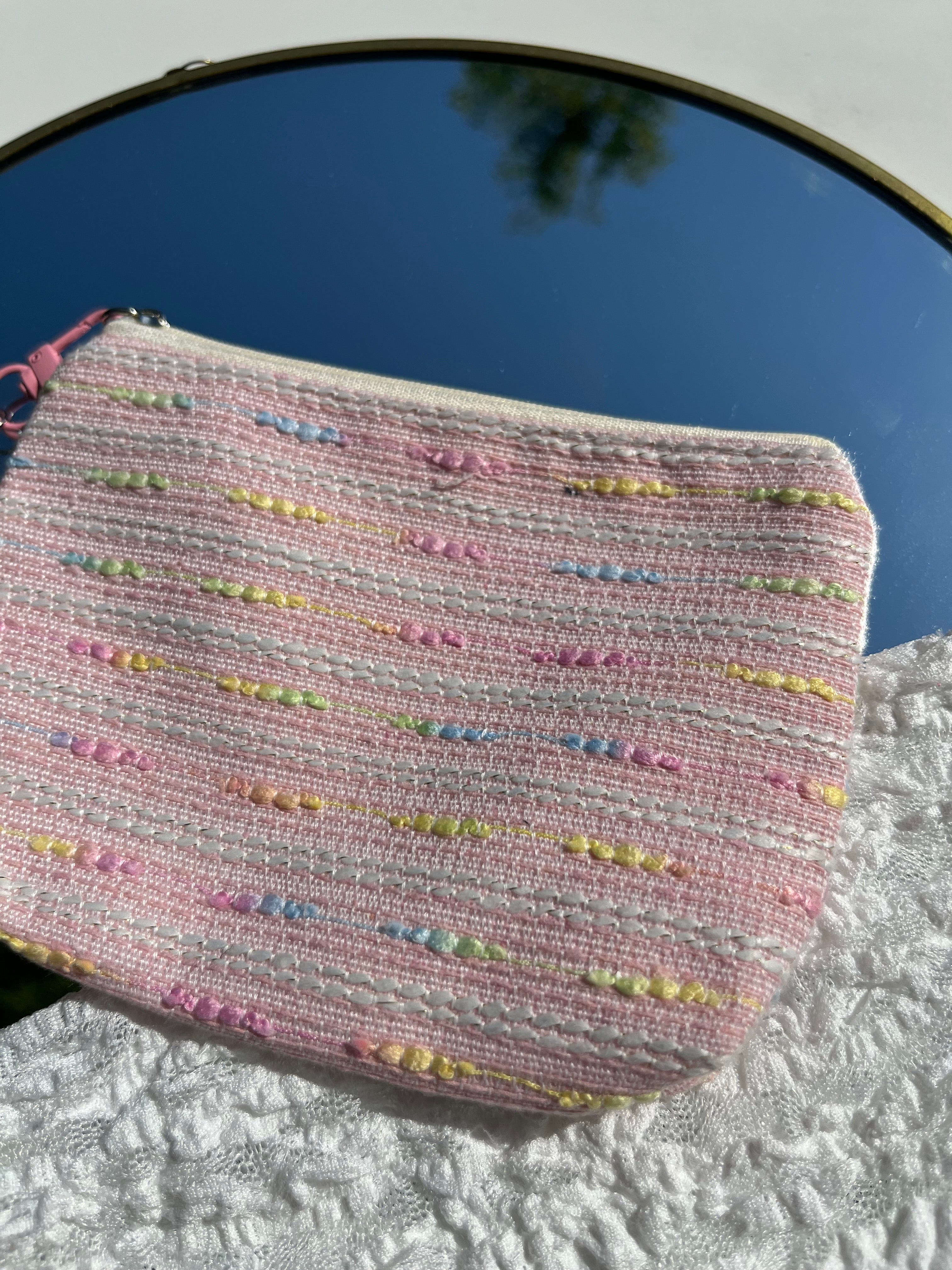 roze toilettas met zeester sleutelhanger