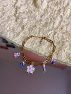 Charm armband pastel flower