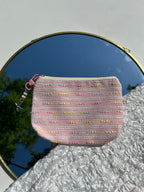 roze toilettas met zeester sleutelhanger