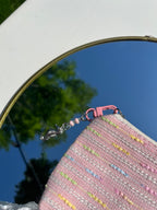 roze toilettas met zeepaard sleutelhanger