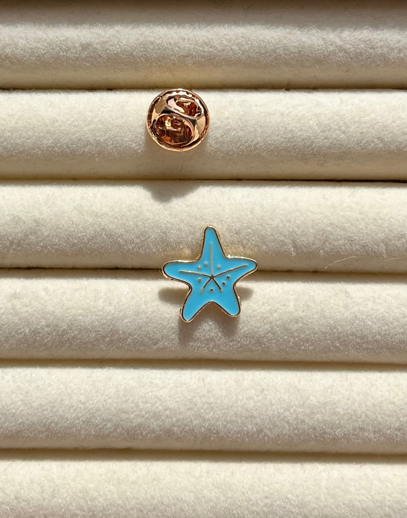 Pin zeester klein